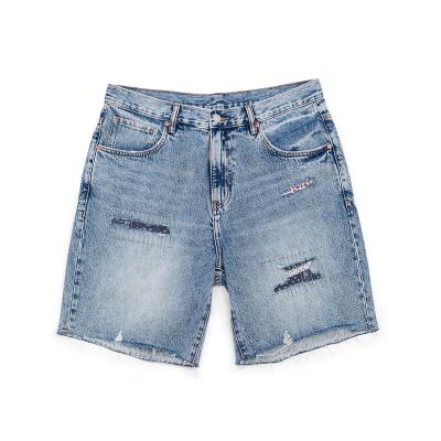 China Breathable Mens Loose Cashew Washed Flower Ripped Denim Five Point Shorts For Men for sale