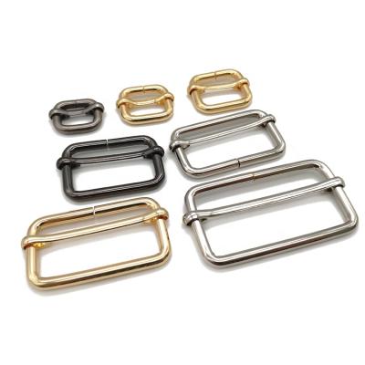 China Factory Alloy 10-51MM Adjustable Garment/Slider Buckle Bags/Belt/Wholesale Metal Tri Belt Slip Strap For Bag Strap for sale