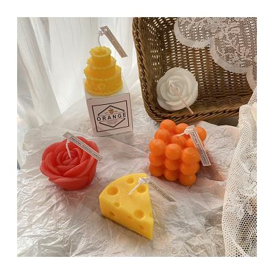 China Handmade birthdays ins style tangerine orange cheese decorative scented aroma scented christmas candle veils cera perfumada soy for sale