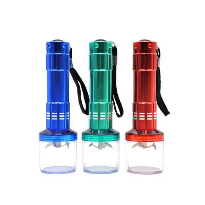 China New Design Dry Unique Automatic Electric Grinder Herb Dry Battery Flashlight Electronic Herb Tobacco Grinder for sale