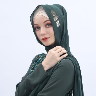 China 2022New Design Word Flower Pearl Hijab Muslim Classic Soft Shiny Shawl High Quality Formal Casual Daily Scarf One for sale