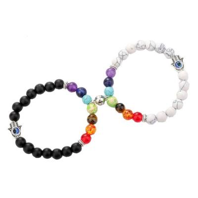 China FASHIONABLE Handmade Natural White Howlite/Black Matte Stone Palm Eye Pendant 7 Chakra Bracelets Magnet Couple Bracelet Fatima Hand Bracelet for sale