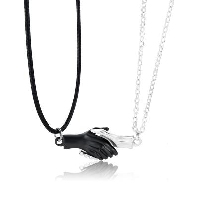 China TRENDY Romantic Flip Hands Couples Magnetic Necklaces Fashion Jewelry Lovers Necklace With Attractive Hand Pendant Valentine's Day Gift for sale