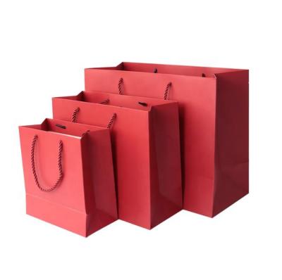 China Fast Recyclable Gift Bag Shopping Paper Bag Goods Wholesale Gift Package Red Art Paper Hot Stamping Offset Printing for sale