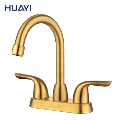 China Faucets Huayi Deck Mounted Dual Handle Metered Luxury Bathroom Faucet Brushed Gold Basin Faucet for sale