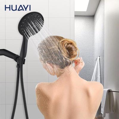 China Without Switch Huayi Bathroom Matte Black High Pressure Handheld Shower Head Water Saving Showerhead for sale