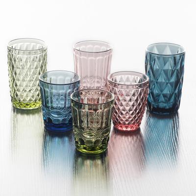 China Custom Retro Colorful Heat Resistant Water Cup Embossed Glass Water Wine Glass Mug for sale