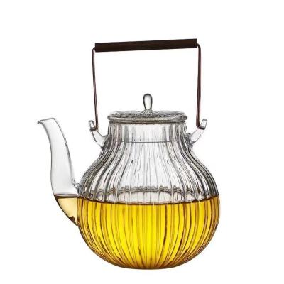 China WITH LID High End Chrysanthemum Petal Pot Heat Resistant Gorosilicate Glass Teapot With Copper for sale