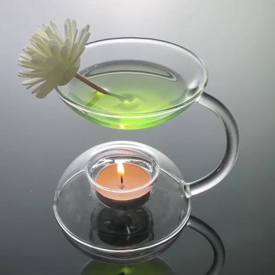 China Modern European Heat Resistant Transparent Glass Fragrance Lamp Home Candlestick Holder for sale