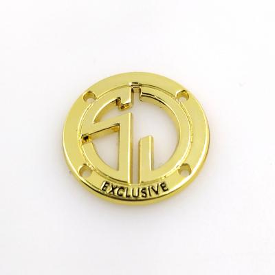 China Viable Custom Clothes Engraved Brand Logo Gold Metallic Plate Label Around Hollow Design Metal Logo for sale