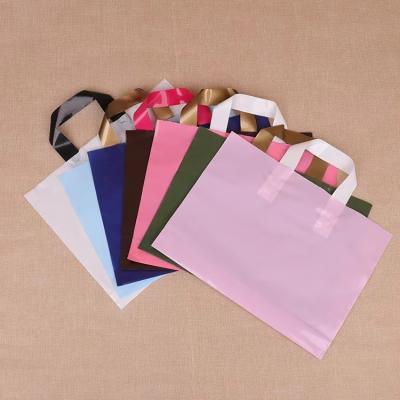 China Customizable Logo Print Transparent Package Plastic Tote Carry Shopping Bag for sale