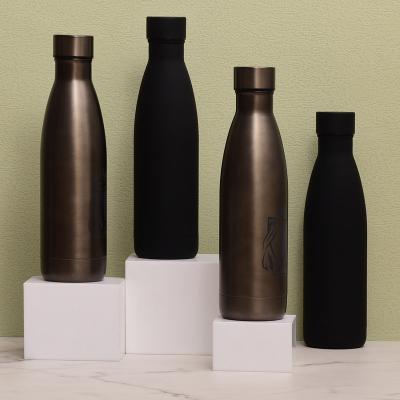 China Custom Sustainable Double Wall Coffee Thermal Frosted Large Metal Bottles With Cap Water Bottles for sale