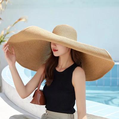 China Wholesale Eco-Friendly Large Stylish Wide Brim Paper Sun Beach Oversized Soft Summer Large Straw Hats For Women Bulk for sale