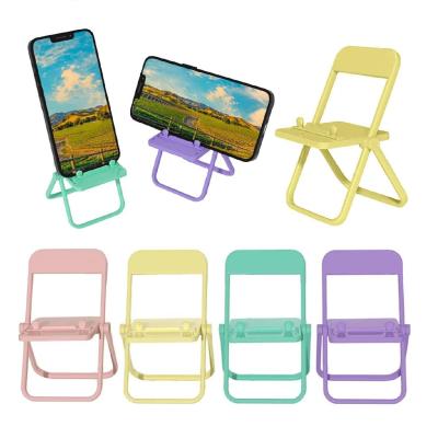 China Mini Chair Shape Cell Phone Holder Adjustable Stand Candy Color Multi-Angle Foldable Universal Cradle For Desktop Tablet Phone for sale