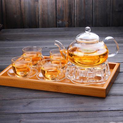 China Viable Celebration Complete Tea Set 600ml Glass Teapot With 6 Double-wall 60ml Glass Tea Cups, Tea Warmer, Removable Glass Infuser for sale