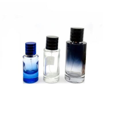 China Best Selling Dark Blue Round Luxury Cosmetic Stock 30ml 50ml 100ML Gradient Round Perfume Empty Glass Spray Bottle Men for sale