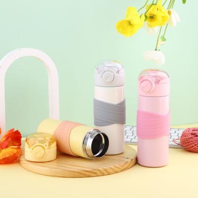 China wholesale thermos mug buckle transparent bounce lid thermos mug with silicone non-slip cover for sale