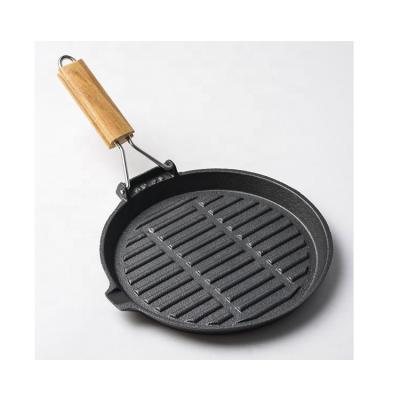 China General use for gas cast iron steak grill pan and induction cooker /skillet fry pan with folding wooden handle for sale for sale