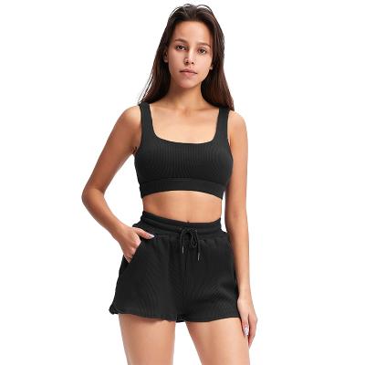 China High quality breathable pure color suit sports shorts, sports tank tops and high-waist pant shorts jogging suits are available for sale