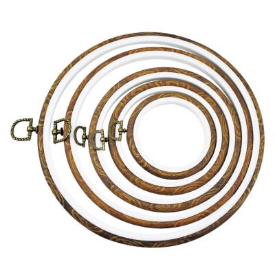 China Durable Wholesale Craft Tool Hand DIY Accessory Wood Like Embroidery Hoop Kit Round Resin Flexible Cross Stitch Frame Rubber Hoops for sale