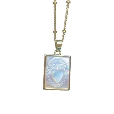 China Wholesale Custom Religious Place Sacred Heart Pendant Necklace For Women Natural White Sea Shell Charm Jewelry 2021 for sale