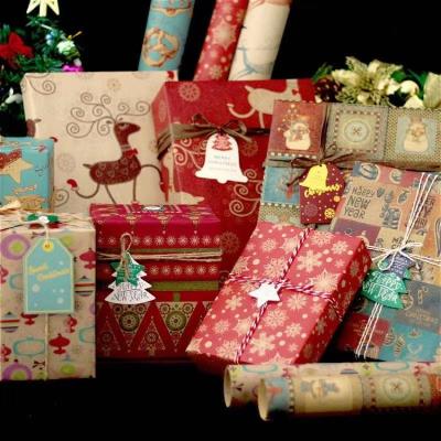 China Custom Printed Tissue Paper Xmas Gift Roll Waterproof Gift Wrapping Paper 80gsm for sale