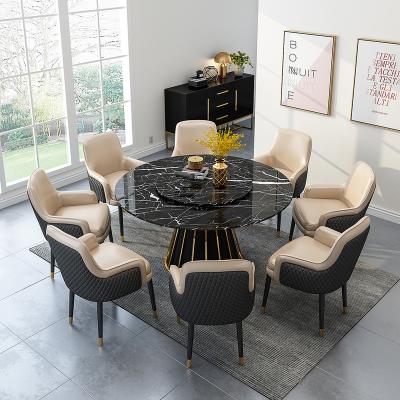 China Good quality modern fashion table round shape luxury black marble top dining table with 8 chairs for sale for sale