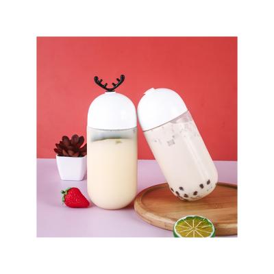 China Food Grade 500ml Good Quality PET Disposable U Shape Bottle Antler Cap Beverage Milk Tea Plastic Bottle for sale