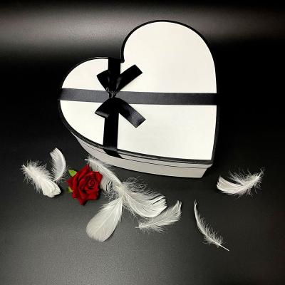 China Recycled Materials Design Recyclable Foam White Ribbon Flower Box Heart Shape Color Cardboard Flower Gift Box For Mothers Day Valentine's Day for sale