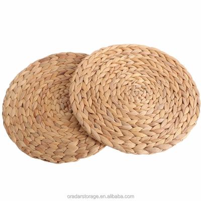 China Water Sustainable Natural Hyacinth Weave Placemat Round Braided Rattan Placemats for sale