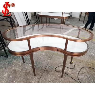 China Latest Jewelry Cabinet Showcase Rose Gold Stainless Steel Metal Glass Jewelry Cabinet Showcase Manufacturer Guangzhou for sale