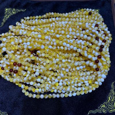 China 100% natural amber pattern wholesale natural Imam cave amber muslim prayer beads russian 8-10mm islamic jewelry white amber for sale