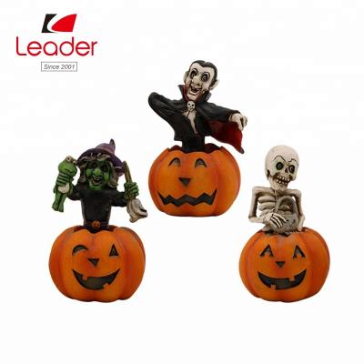 China Hand Painted Resin Ghost Statue Halloween Party Decoration Resin Ghost Standing on Pumpkin Statue for sale