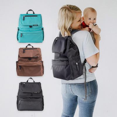 China Multifunctional Mommy and Me Large Capacity Baby Diaper Backpack Mummy Baby Backpack Diaper Bag Bags for sale