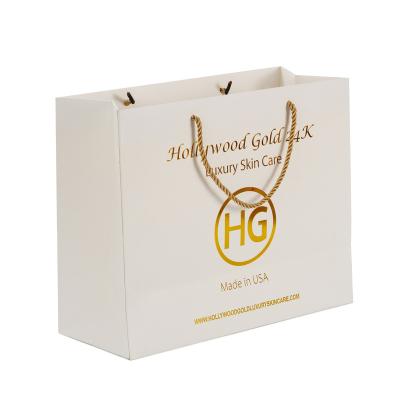 China Handmade Custom Luxury Gold Foil White Paper Bags With Your Own Logo White for sale