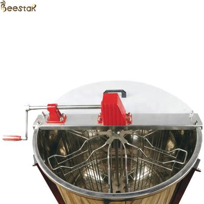 China 6 Frames Stainless Steel Manual Honey Extractor Hand Crank Extractor With Legs for sale