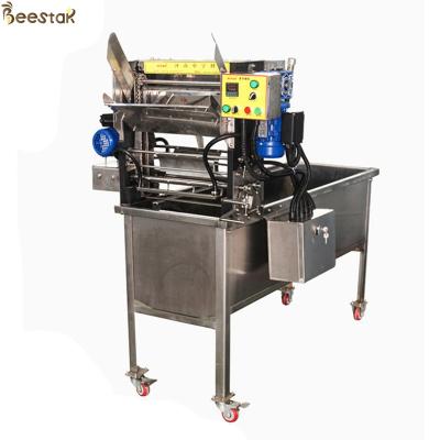 Chine Machine automatique de décapage d'acier inoxydable outils d'abeille de miel ouvre automatiquement machine de miel pour l'apiculture à vendre