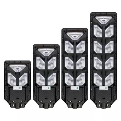 China Waterproof Motion Sensor Remote Control 300w 500w 700w 900w ROAD High Power Outdoor Super Brightness All In One Solar Street Light for sale