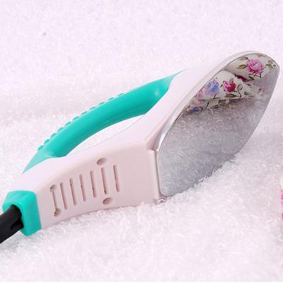 China Handheld Heart Mini Electrostatic Iron Professional Fashion Cordless Iron for sale