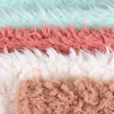 China Luxury 100% Polyester Toy Faux Fur Plush Fleece Long Faux Fur Fabric for sale