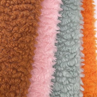 China Exquisite 100%polyester anti pill knitted wool sherpa fleece for apparel and accessories for sale