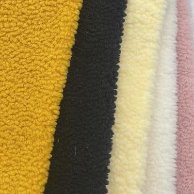 China Anti pill fashion 100%polyester knitted velvet fleece sherpa fabric for clothes for sale