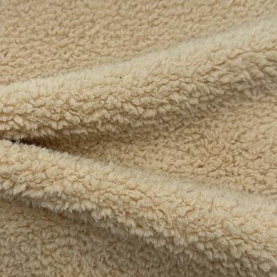 China 100%polyester anti pill brushed sherpa fleece for clothes for sale