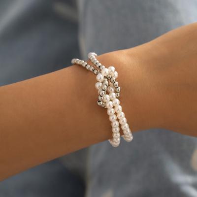 China Jewelry casual/sports women's fashion personality simple bead splicing and knotting soft cross bracelet bracelet for sale