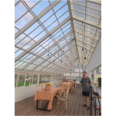 China Modern sun house sunroom with electric roof glass for saleglass beautiful garden house solarium for sale