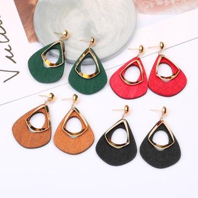 China 2021 new hyperbole alloy droplet-shaped wooden earrings exaggerated style hot-selling ladies' punk earrings for sale