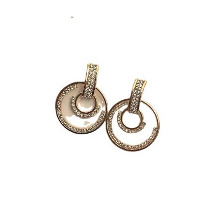 China Full Diamond 2021 New Style 925 Double Needle Romantic Silver Circle Around Women's Gold Plated Earrings for sale