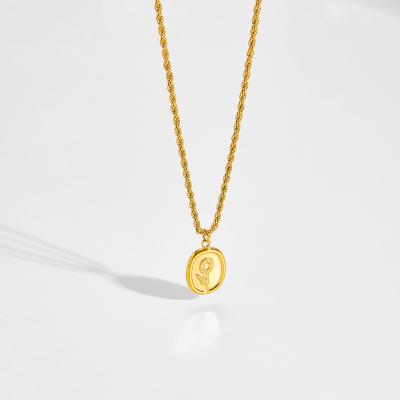 China Retro Titanium CLASSIC British Luxury Simple Oval Flower Pendant Necklace Sunflower Pattern Light 18K Gold Steel Plated Jewelry for sale