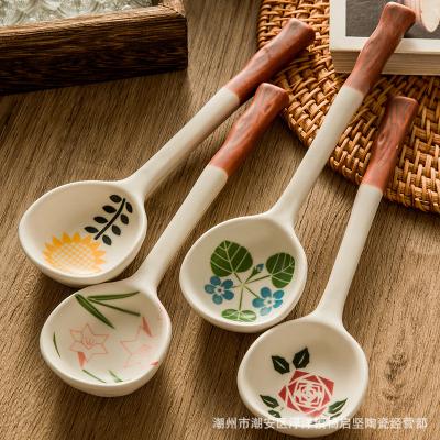 China Sustainable Quality Japanese Glazed Ceramic Soup Spoon Long Handle Handmade Tableware Half for sale