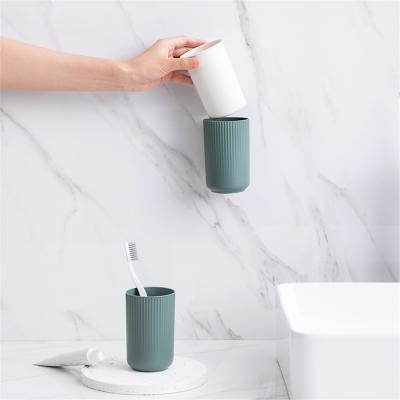 China Nordic Minimalist Wall Mounted Couples Wash Toothbrush Cup Pinmoo Viable Magnetic Mouthwash Cup Toothbrush Cup Set for sale